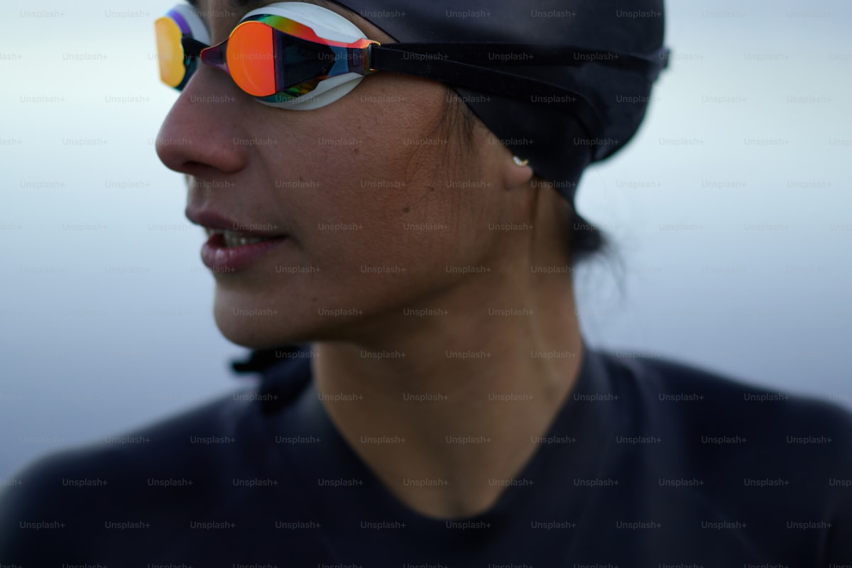 Swimmer practising bilateral breathing technique in pool