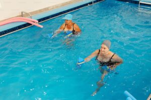 Swim Paddles and Pull Buoy Strength Set: Build Your Catch and Pull