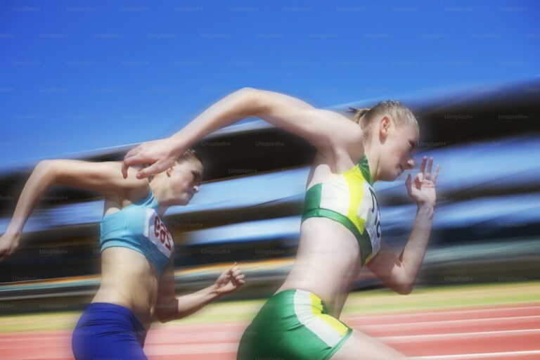 Athlete sprinting on athletics track